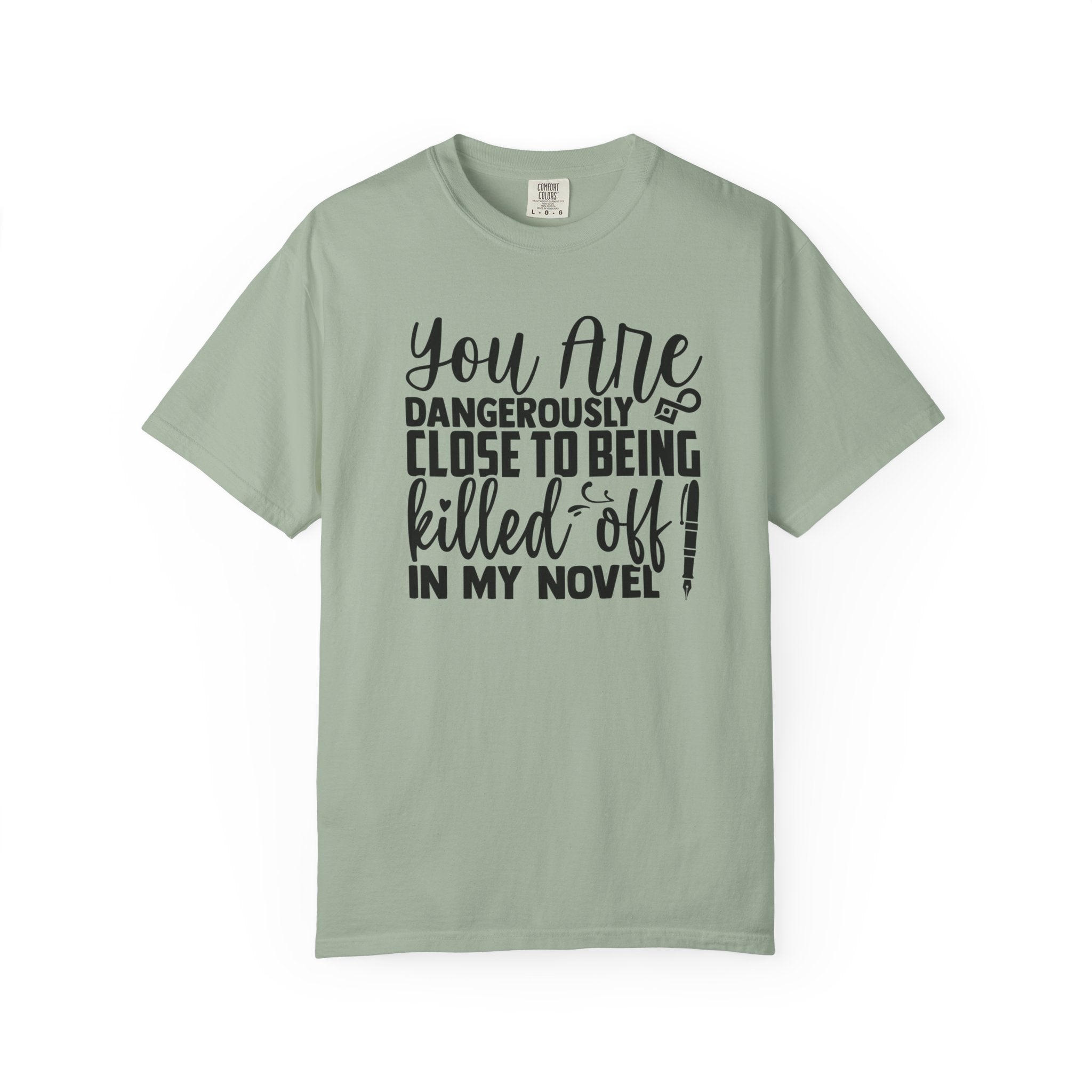 Novelist T‑Shirt — “You Are Dangerously Close to Being Killed Off in My Novel” Funny Writer Tee