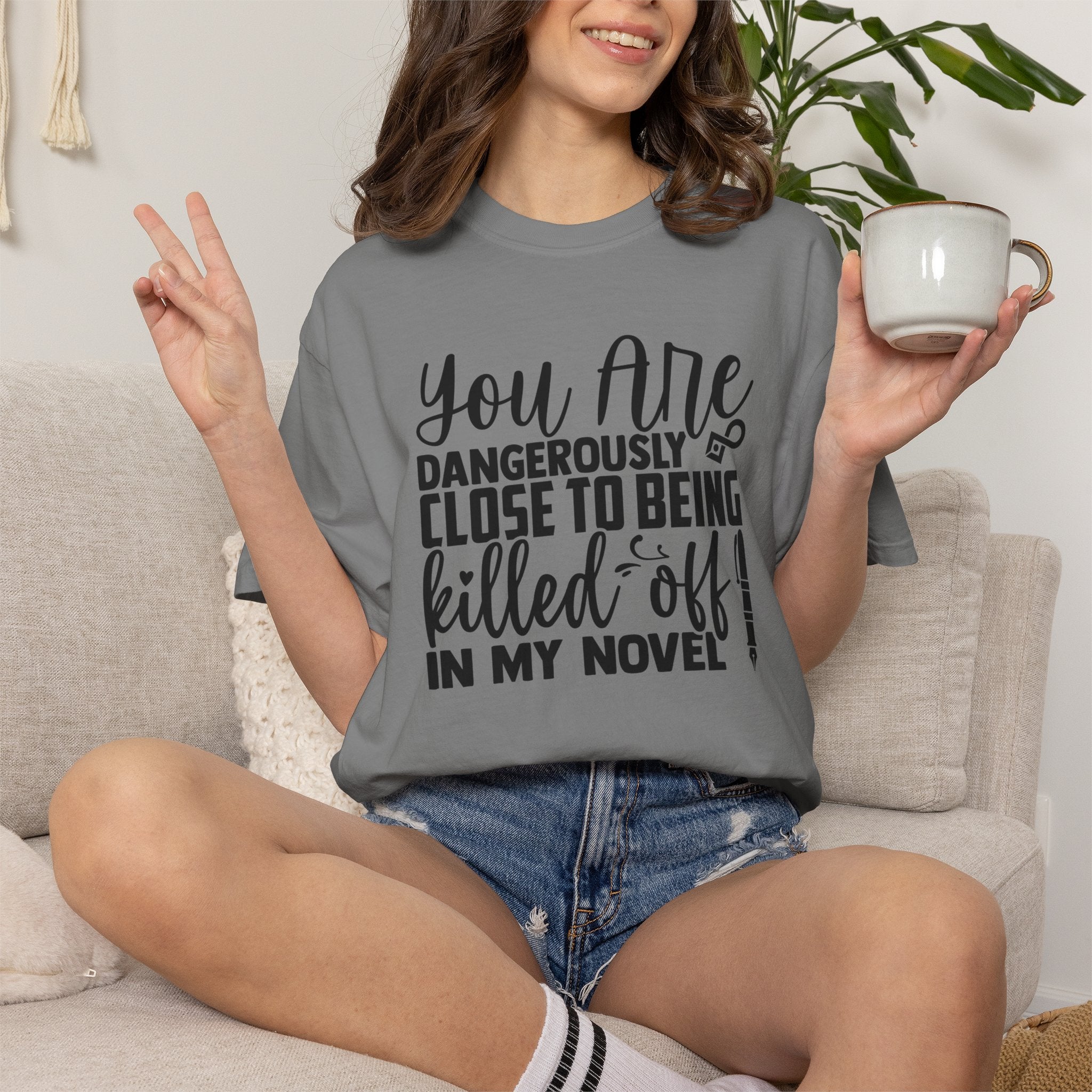 Novelist T‑Shirt — “You Are Dangerously Close to Being Killed Off in My Novel” Funny Writer Tee
