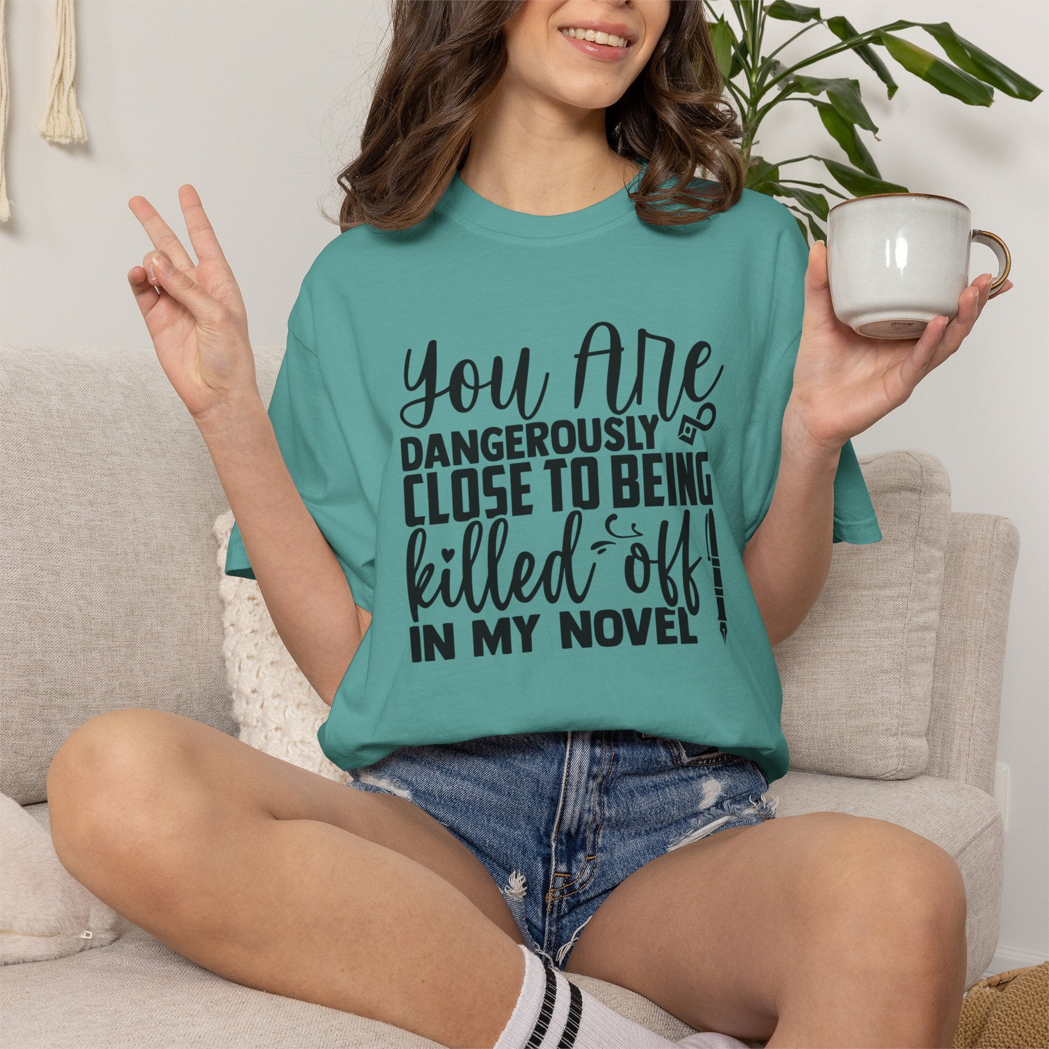 Novelist T‑Shirt — “You Are Dangerously Close to Being Killed Off in My Novel” Funny Writer Tee