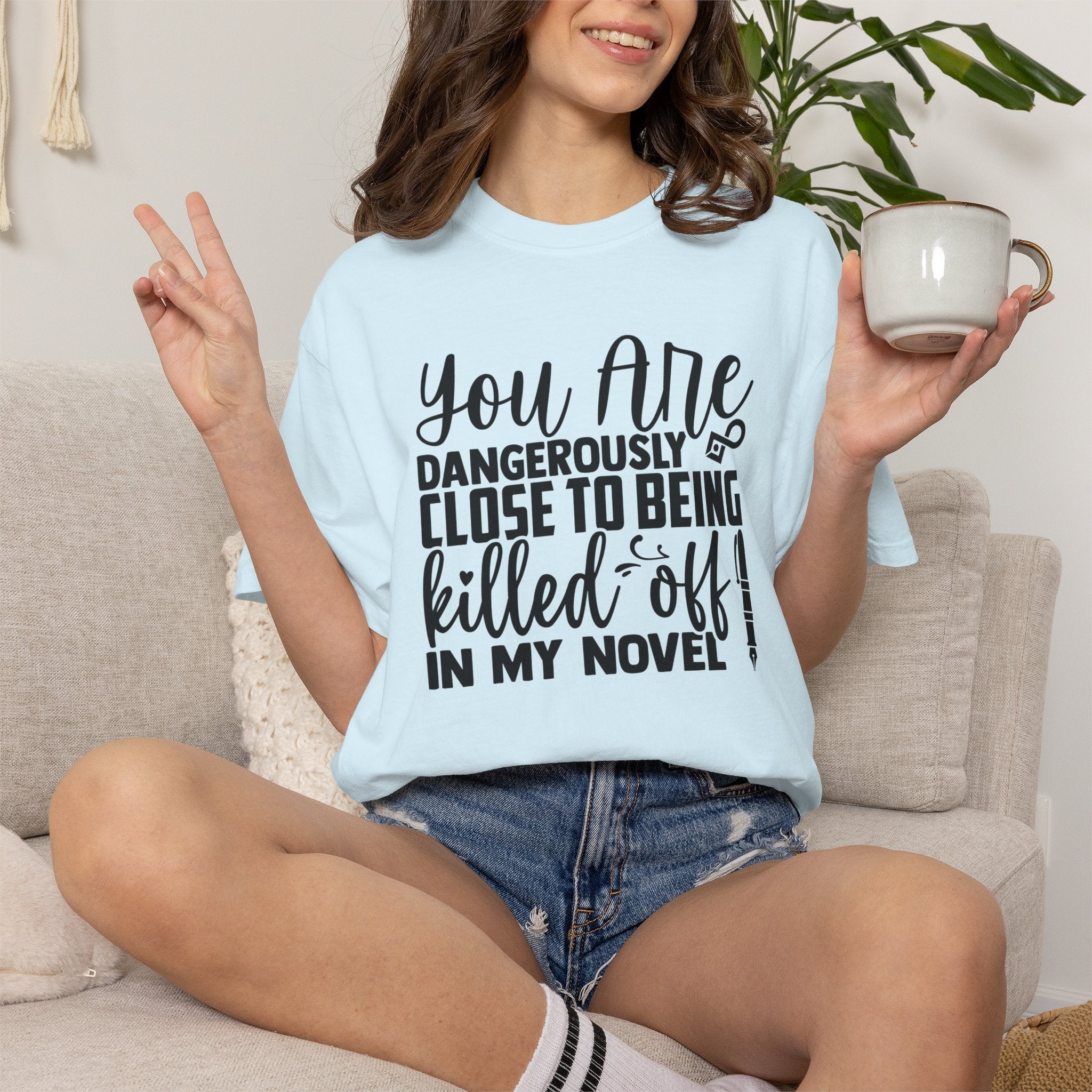 Novelist T‑Shirt — “You Are Dangerously Close to Being Killed Off in My Novel” Funny Writer Tee