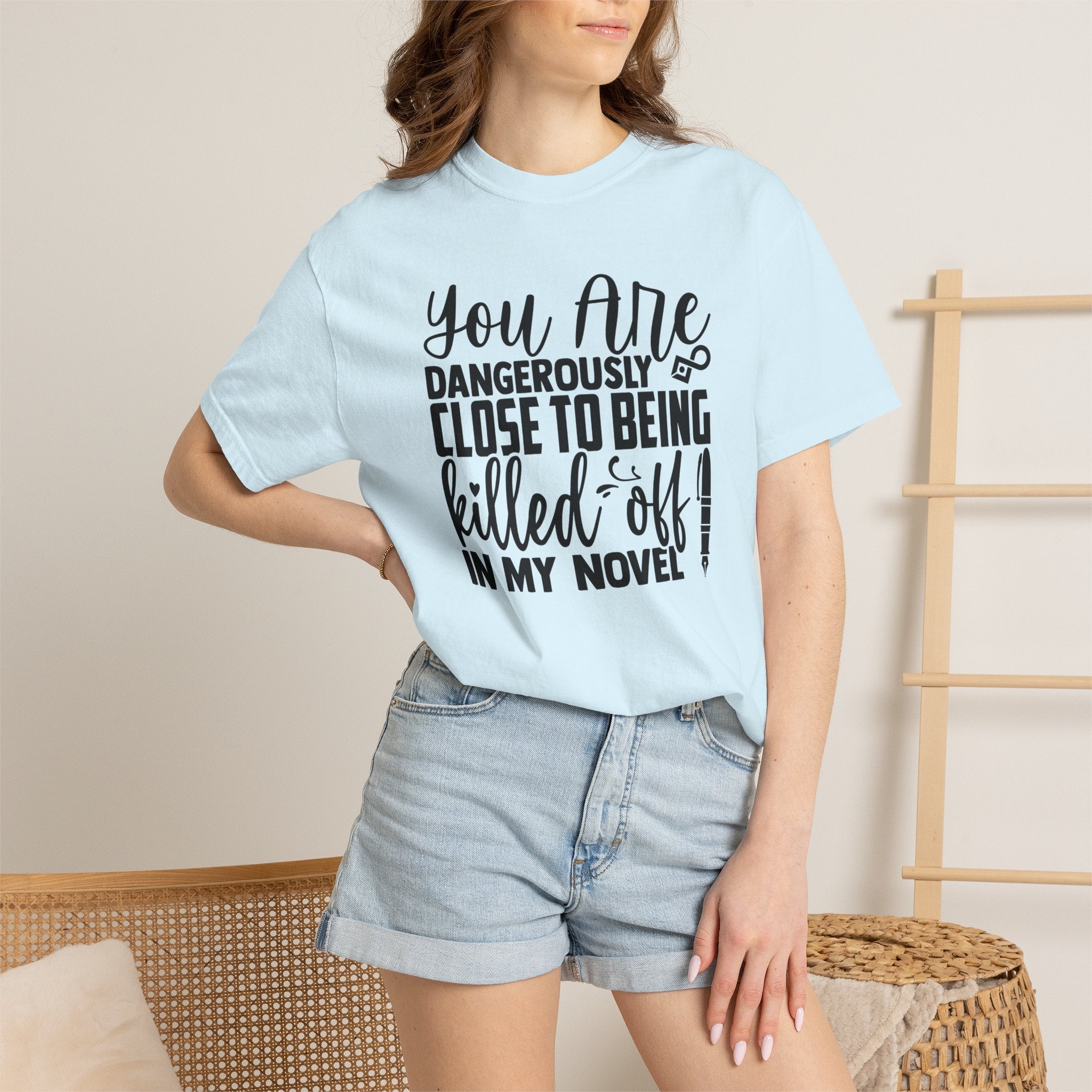 Novelist T‑Shirt — “You Are Dangerously Close to Being Killed Off in My Novel” Funny Writer Tee